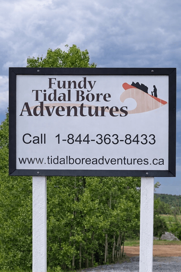 Fundy Tidal Bore Adventures rafting tour sign near the Shubenacadie River in Nova Scotia